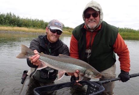 Fly fishing for dolly varden at Alaska West.