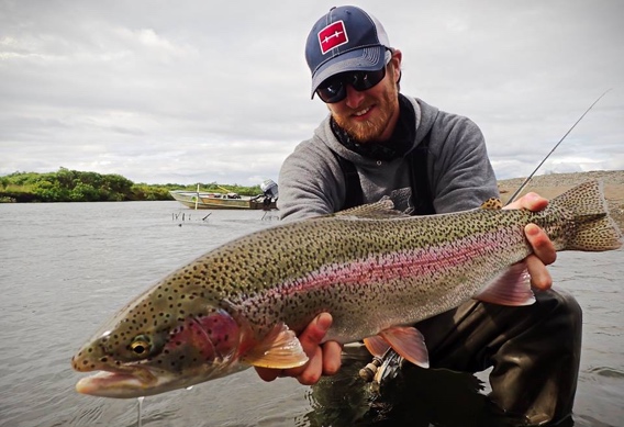 Kyle Shea fly fishing for rainbow trout at Alaska West.