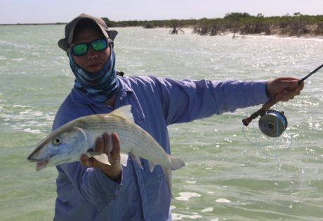 Fly fishing for bonefish by Peter Vaiu.