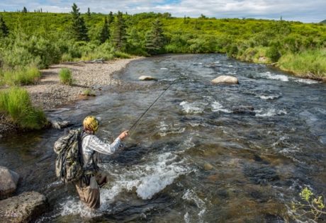 Fly fishing at Rapids Camp Lodge by Abe Blair