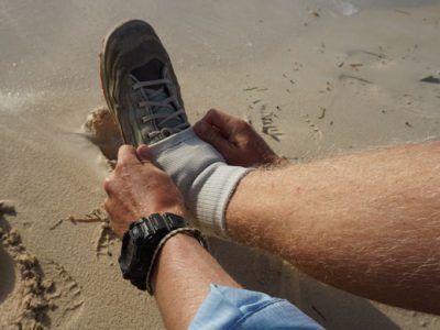 Keeping sand out of wading boots.