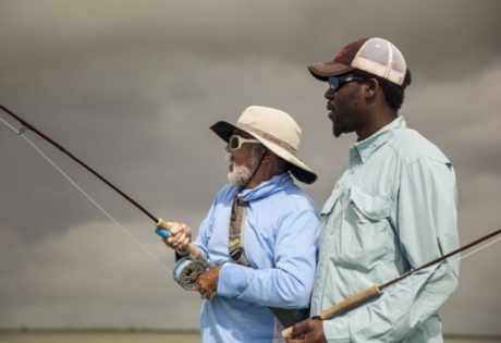 Fighting bonefish at Andros South by Hollis Bennett.