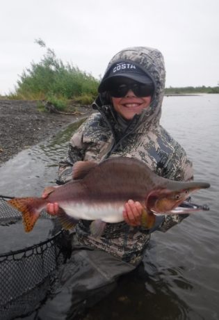 Cooper White with a pink salmon
