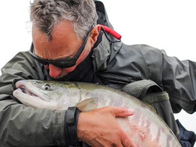 Angler kissing chum salmon