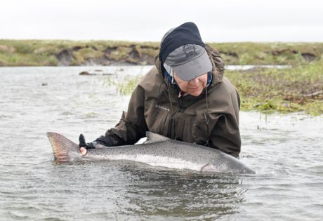 Kathy Whiting with a big king salmon from Alaska West